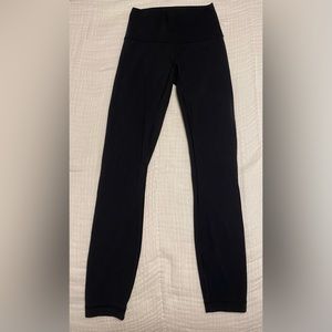 Lululemon Wunder Train High-Rise Tight 25", size 0 in the color Black